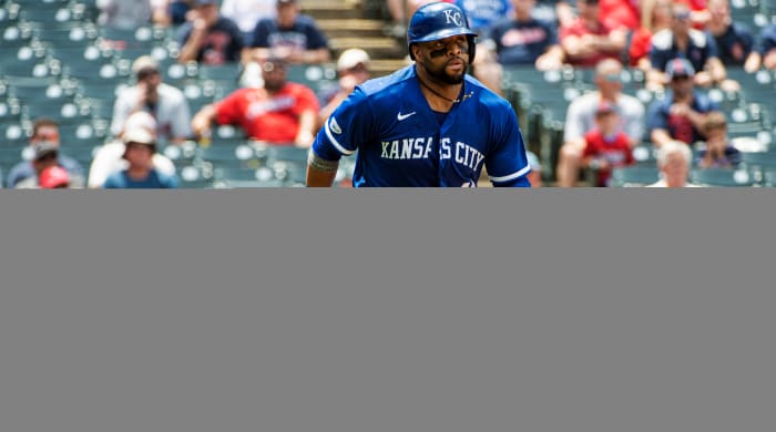 Kansas City Royals’ Carlos Santana heads to first base after hitting a single off Cleveland Guardians starting pitcher Konnor Pilkington during the fourth inning of a baseball game in Cleveland, Tuesday, June 1, 2022.